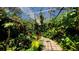 Lush indoor garden with variety of plants at 888 S Orange Ave # 3D, Sarasota, FL 34236