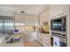 Modern kitchen with stainless steel appliances and ample counter space at 888 S Orange Ave # 3D, Sarasota, FL 34236