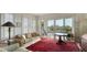 Spacious living room with water views and comfy seating at 888 S Orange Ave # 3D, Sarasota, FL 34236