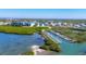 Aerial view showing community buildings and waterfront access at 9203 Griggs Rd # B304, Englewood, FL 34224