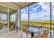 Relaxing balcony with water views and outdoor seating at 9203 Griggs Rd # B304, Englewood, FL 34224