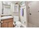 Small bathroom with walk-in shower at 9203 Griggs Rd # B304, Englewood, FL 34224
