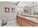 Double vanity bathroom with granite countertop at 9203 Griggs Rd # B304, Englewood, FL 34224