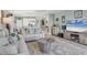 Open living room with kitchen view and seating area at 9203 Griggs Rd # B304, Englewood, FL 34224
