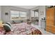Main bedroom with water views and private balcony at 9203 Griggs Rd # B304, Englewood, FL 34224