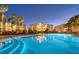 Night view of resort-style pool with building reflection at 9203 Griggs Rd # B304, Englewood, FL 34224