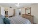 Main bedroom with large closet and access to bathroom at 104 Capri Isles Blvd # 112, Venice, FL 34292
