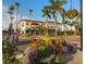 Charming street scene with shops and flowers at 104 Capri Isles Blvd # 112, Venice, FL 34292