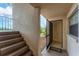Condo entryway with stairs and door leading inside at 104 Capri Isles Blvd # 112, Venice, FL 34292