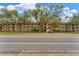 Condo building exterior, showcasing street view at 104 Capri Isles Blvd # 112, Venice, FL 34292
