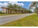 Front view of condo building, showcasing curb appeal at 104 Capri Isles Blvd # 112, Venice, FL 34292