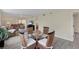 Spacious living room with comfortable seating and large windows at 104 Capri Isles Blvd # 112, Venice, FL 34292