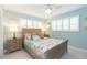 Guest bedroom with coastal decor and wooden bed frame at 1110 2Nd S Ave, Tierra Verde, FL 33715