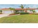 Attractive single-story home with a two-car garage at 1110 2Nd S Ave, Tierra Verde, FL 33715