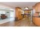 Open kitchen with island and stainless steel appliances at 1110 2Nd S Ave, Tierra Verde, FL 33715