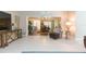 Relaxing living room with sectional sofa and view to dining area at 1110 2Nd S Ave, Tierra Verde, FL 33715