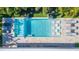 Stunning pool with lounge chairs and fire features at 1110 2Nd S Ave, Tierra Verde, FL 33715