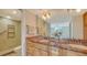 Double vanity bathroom with granite countertops at 1111 N Gulfstream Ave # 3E, Sarasota, FL 34236