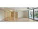 Spacious bedroom with mirrored closet and balcony access at 1111 N Gulfstream Ave # 3E, Sarasota, FL 34236