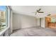 Bedroom with city views and ceiling fan at 1111 N Gulfstream Ave # 3E, Sarasota, FL 34236