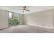 Bright bedroom with city views and ceiling fan at 1111 N Gulfstream Ave # 3E, Sarasota, FL 34236