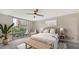 Relaxing bedroom with large window and stylish decor at 1111 N Gulfstream Ave # 3E, Sarasota, FL 34236