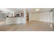 Open dining area with kitchen views and breakfast bar at 1111 N Gulfstream Ave # 3E, Sarasota, FL 34236