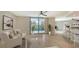 Casual dining area with balcony view and breakfast bar at 1111 N Gulfstream Ave # 3E, Sarasota, FL 34236