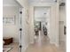 Bright and airy entryway leading to the living areas at 12199 Sebring Ln, Venice, FL 34293