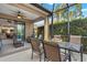 Spacious screened patio with access to living area and backyard at 12199 Sebring Ln, Venice, FL 34293