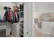 Large walk-in closet with ample shelving and hanging space at 12199 Sebring Ln, Venice, FL 34293