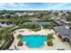 Community pool, tennis courts, and clubhouse aerial view at 12240 Whisper Lake Dr, Bradenton, FL 34211