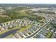 Community overview with various homes and landscape at 12240 Whisper Lake Dr, Bradenton, FL 34211