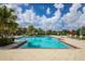 Expansive community pool with plenty of lounge chairs at 12240 Whisper Lake Dr, Bradenton, FL 34211