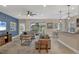 Spacious living area with sectional sofa and large TV at 12240 Whisper Lake Dr, Bradenton, FL 34211