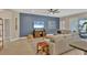 Open living room featuring a neutral color palette and accent wall at 12240 Whisper Lake Dr, Bradenton, FL 34211