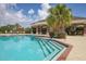 Steps leading into the refreshing community pool at 12240 Whisper Lake Dr, Bradenton, FL 34211