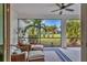 Relaxing screened porch with wicker furniture and backyard view at 12240 Whisper Lake Dr, Bradenton, FL 34211