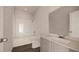 Clean bathroom with a bathtub, toilet, and vanity at 13029 Cedar Elm Lane, Parrish, FL 34219
