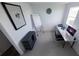 Bright home office featuring a desk, computer, and whiteboard at 13029 Cedar Elm Lane, Parrish, FL 34219