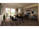 Modern kitchen with stainless steel appliances and an eat-in dining area at 13029 Cedar Elm Lane, Parrish, FL 34219