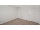 Bedroom with two closets and neutral carpeting at 13033 Cedar Elm Lane, Parrish, FL 34219