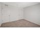 Spacious bedroom with neutral-toned carpet and walls at 13115 Cedar Elm Lane, Parrish, FL 34219