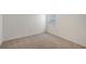Simple bedroom with neutral wall and carpet colors at 13115 Cedar Elm Lane, Parrish, FL 34219