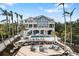 Luxury home with pool and patio overlooking the water at 144 N Casey Key Rd, Osprey, FL 34229