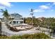 Waterfront property with expansive patio and dock at 144 N Casey Key Rd, Osprey, FL 34229