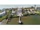 Luxury waterfront home with private dock and pool at 144 N Casey Key Rd, Osprey, FL 34229
