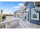 Private balcony with spiral staircase and water views at 144 N Casey Key Rd, Osprey, FL 34229