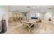 Basement recreation room with pool table, bar, and seating at 144 N Casey Key Rd, Osprey, FL 34229