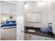 Vanity with granite countertop and modern fixtures at 144 N Casey Key Rd, Osprey, FL 34229